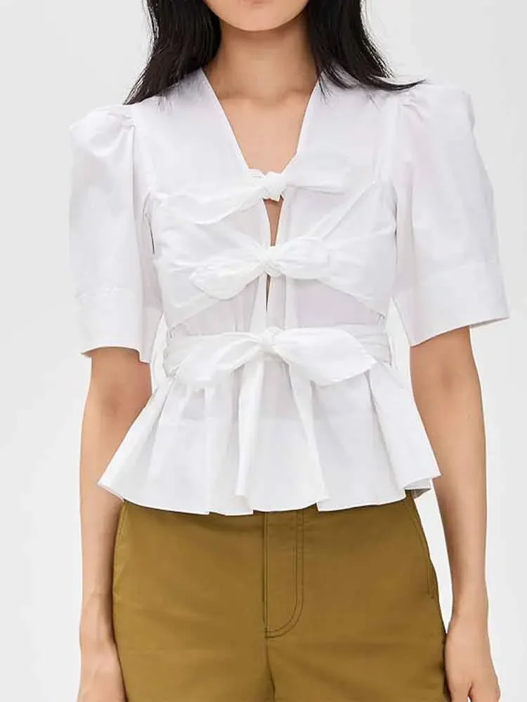 

European style new women's fashion all-match temperament French V-neck lace-up lantern sleeve shirt