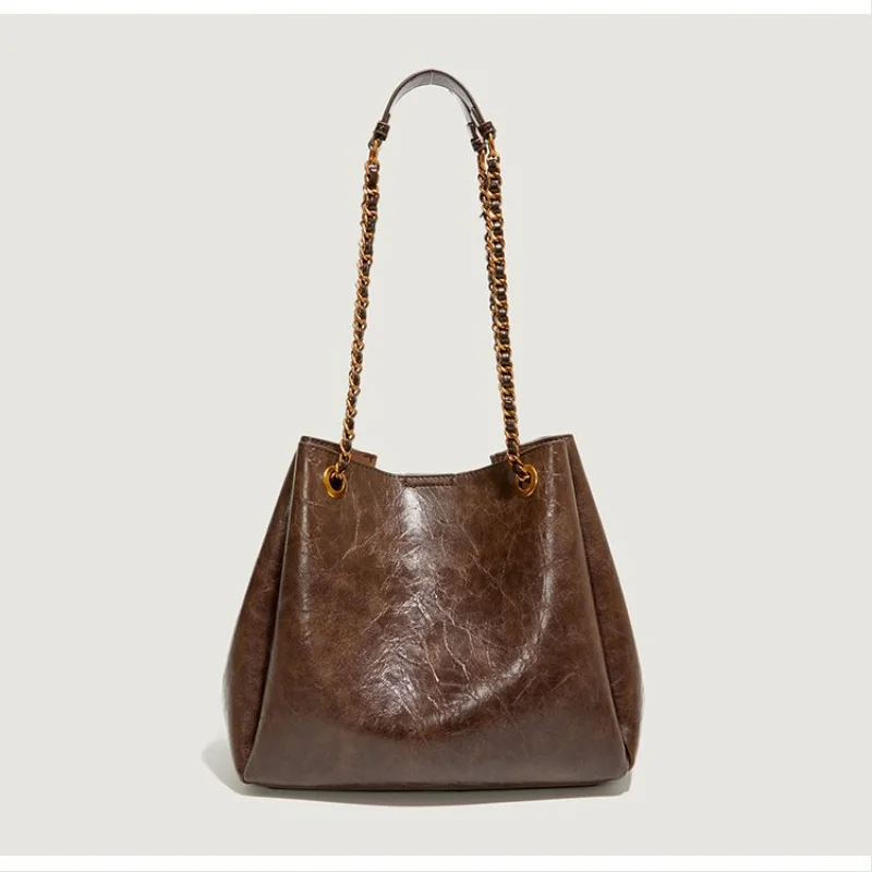 高級レザー製の女性用ショルダーバッグ、パリのカジュアルでエレガントなデイリールックを演出します。 ​