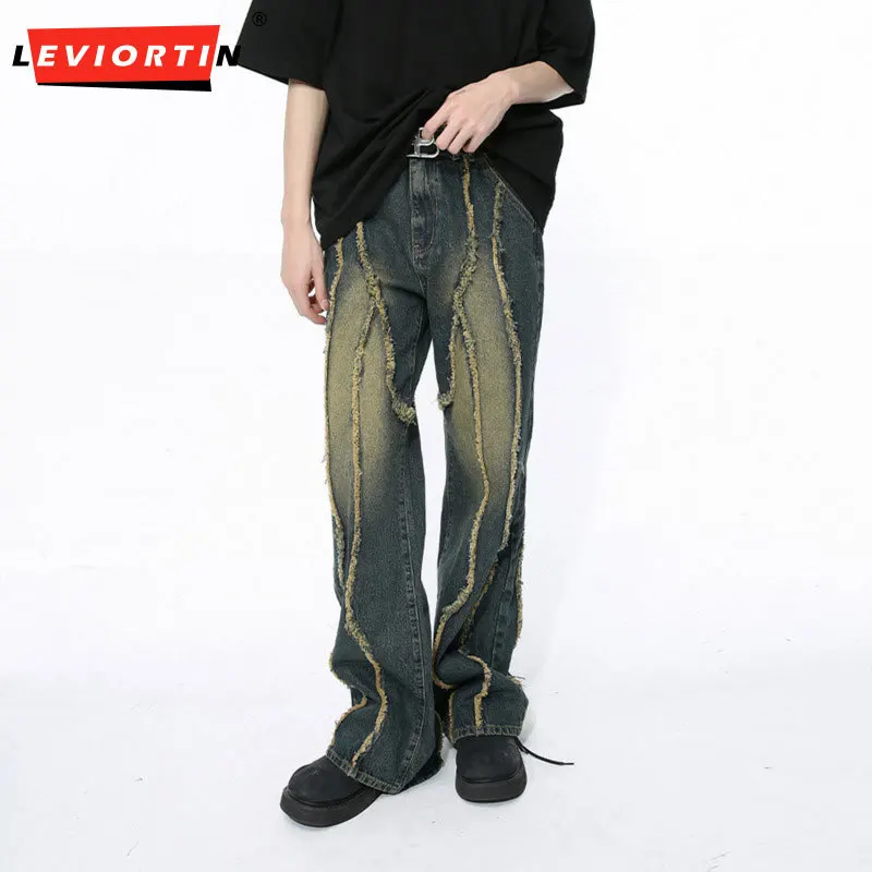 Spring denim pants new Korean version niche deconstruction with distressed edge stitching design, washed loose jeans for men