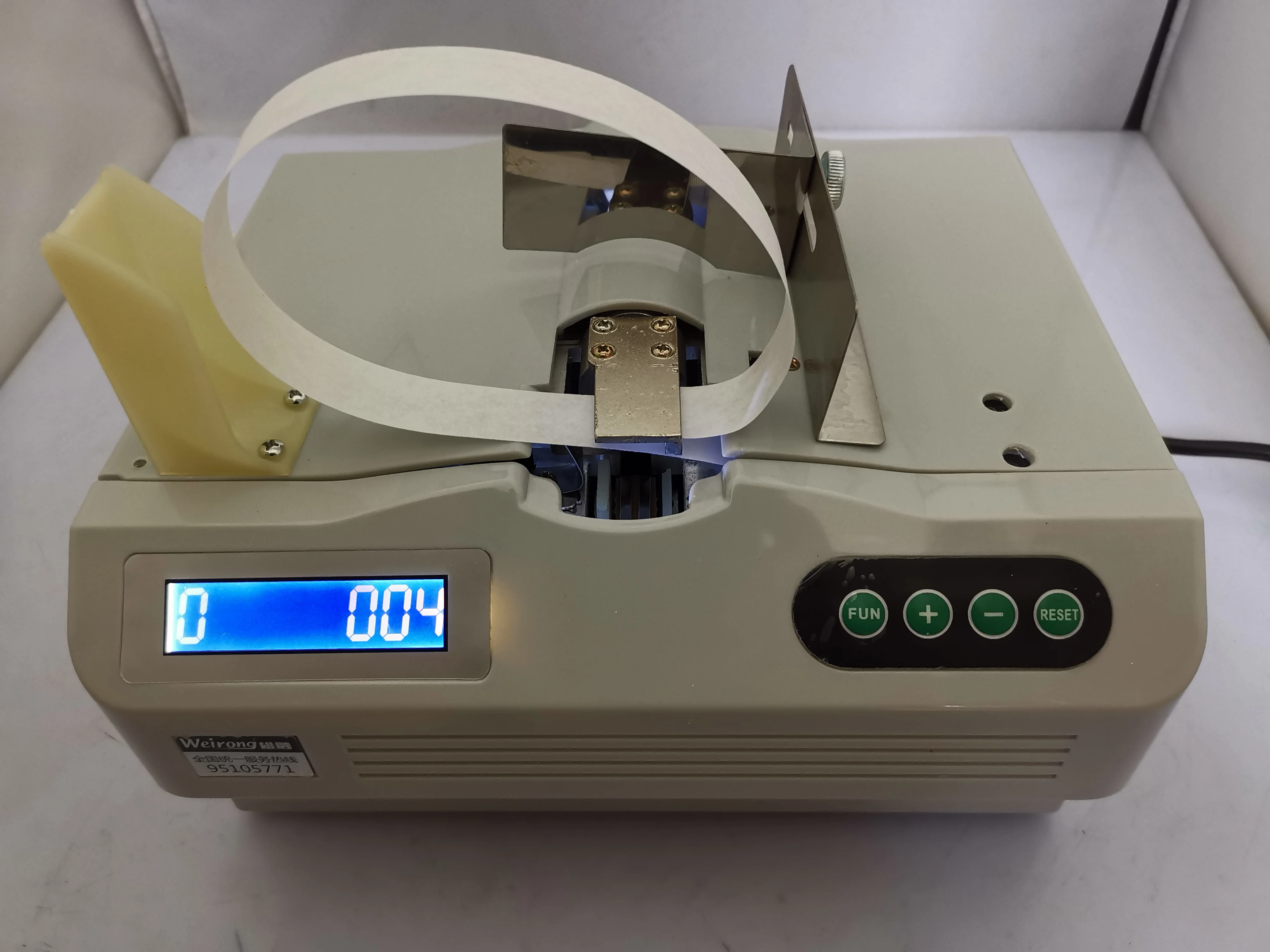 

Automatic paper tape binding machine, automatic banknote binding machine, document and receipt binding machine