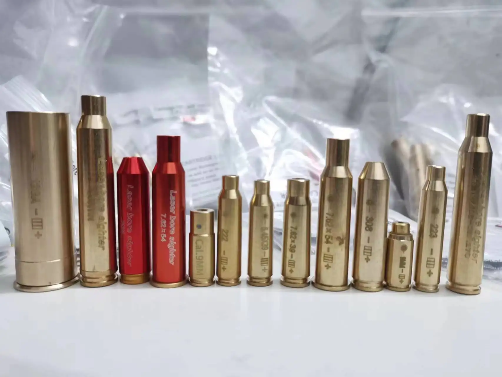 Taktyczny czerwony celownik laserowy nabój 9mm 12GA 20GA .223 .308 5.45x39 7.62x39 9x19mm nasadki treningowe