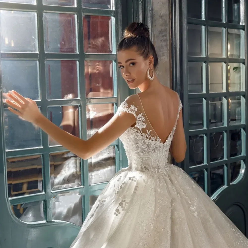 Abiti da sposa graziosi personalizzati con applicazioni di abiti da ballo Vestido Casamento O-Collo Backless Robe Mariage Abiti da sposa lucidi