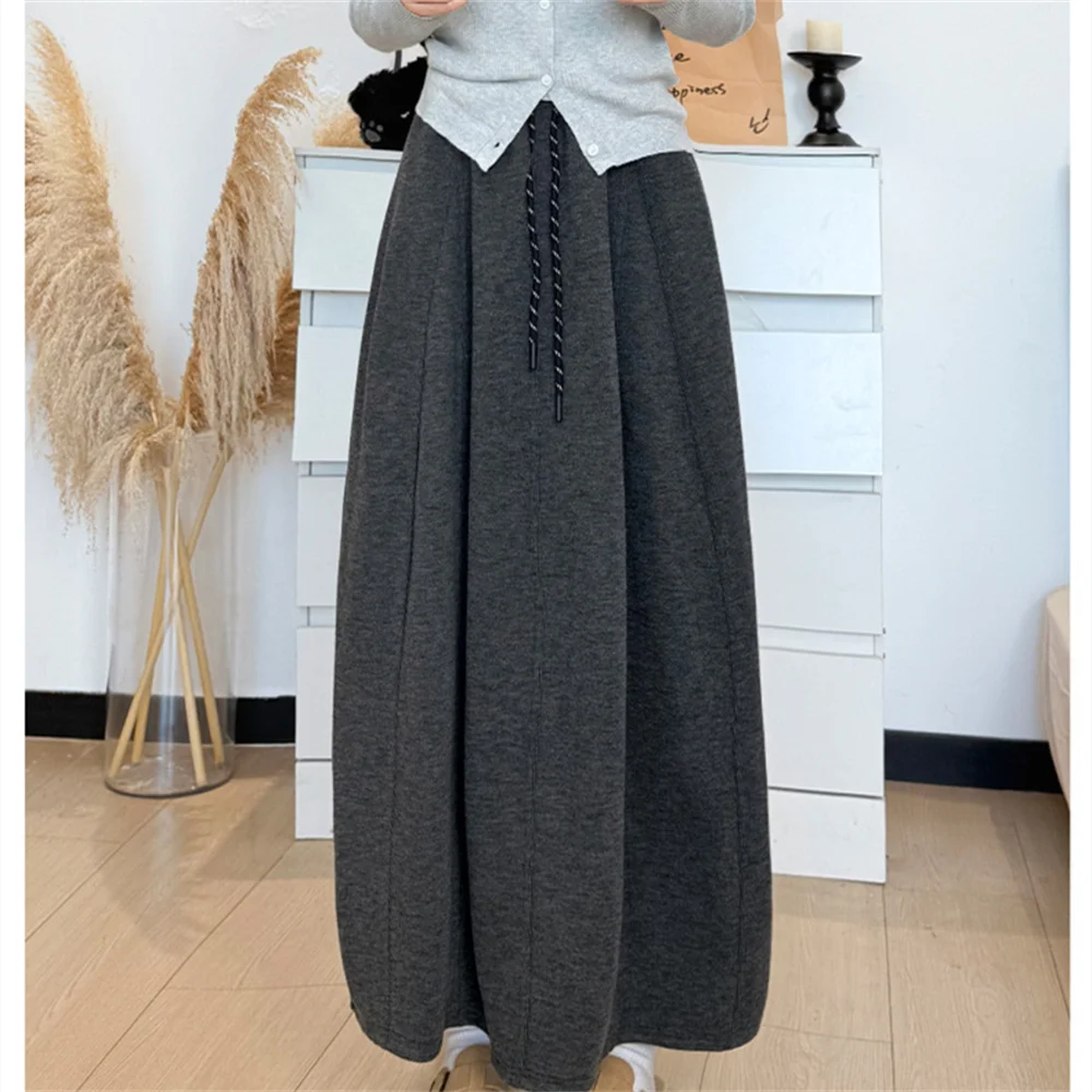 تنورة طويلة برباط عالية الخصر لربيع 2025 للسيدات للخريف والشتاء تنانير متوسطة الطول دافئة للسيدات تنورة ماكسي كورية بلون واحد #3