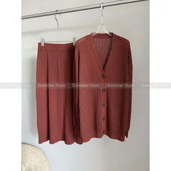 Early autumn new 24 lazy style French retro V-neck niche high-level sense of knitted cardigan elastic waist half skirt suit