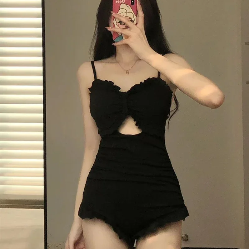 

2024 Women Ruffle Hollow Out Sexy Backless Bikini Butterfly Black Solid Swimwear One Piece Lace-up Elegant Female Bathing Suit