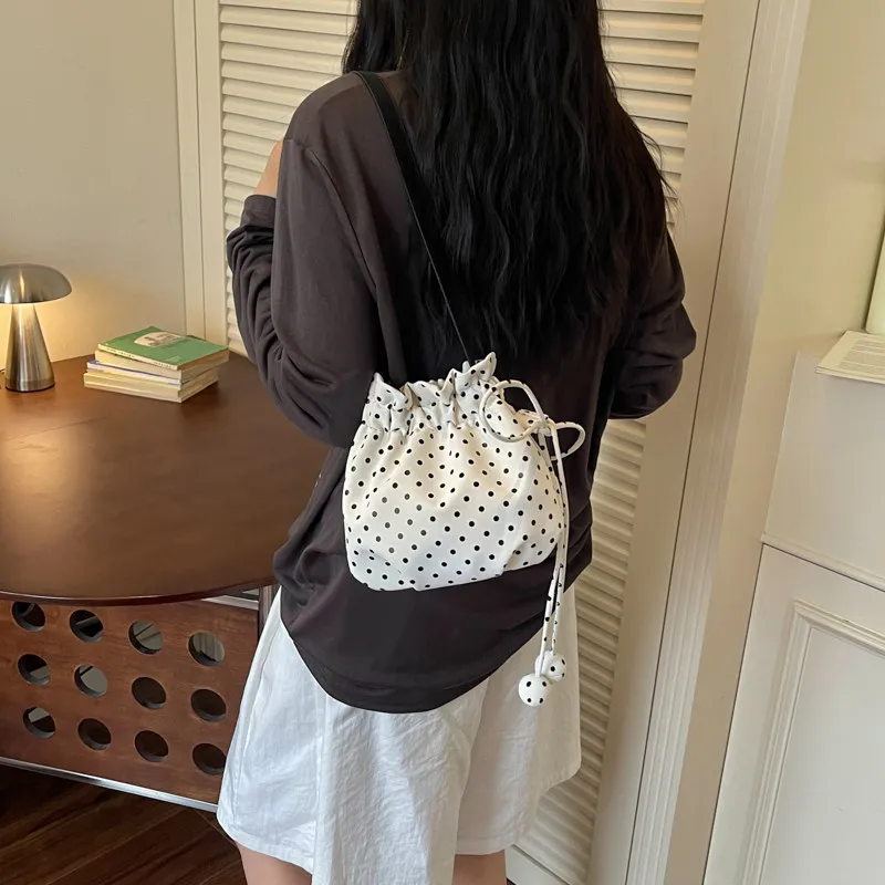 Polka Dot Drawstring Bucket Crossbody Bag for Women Cute Ball Pendant Soft Fabric Shoulder Purse Daily Casual Mini Handbag