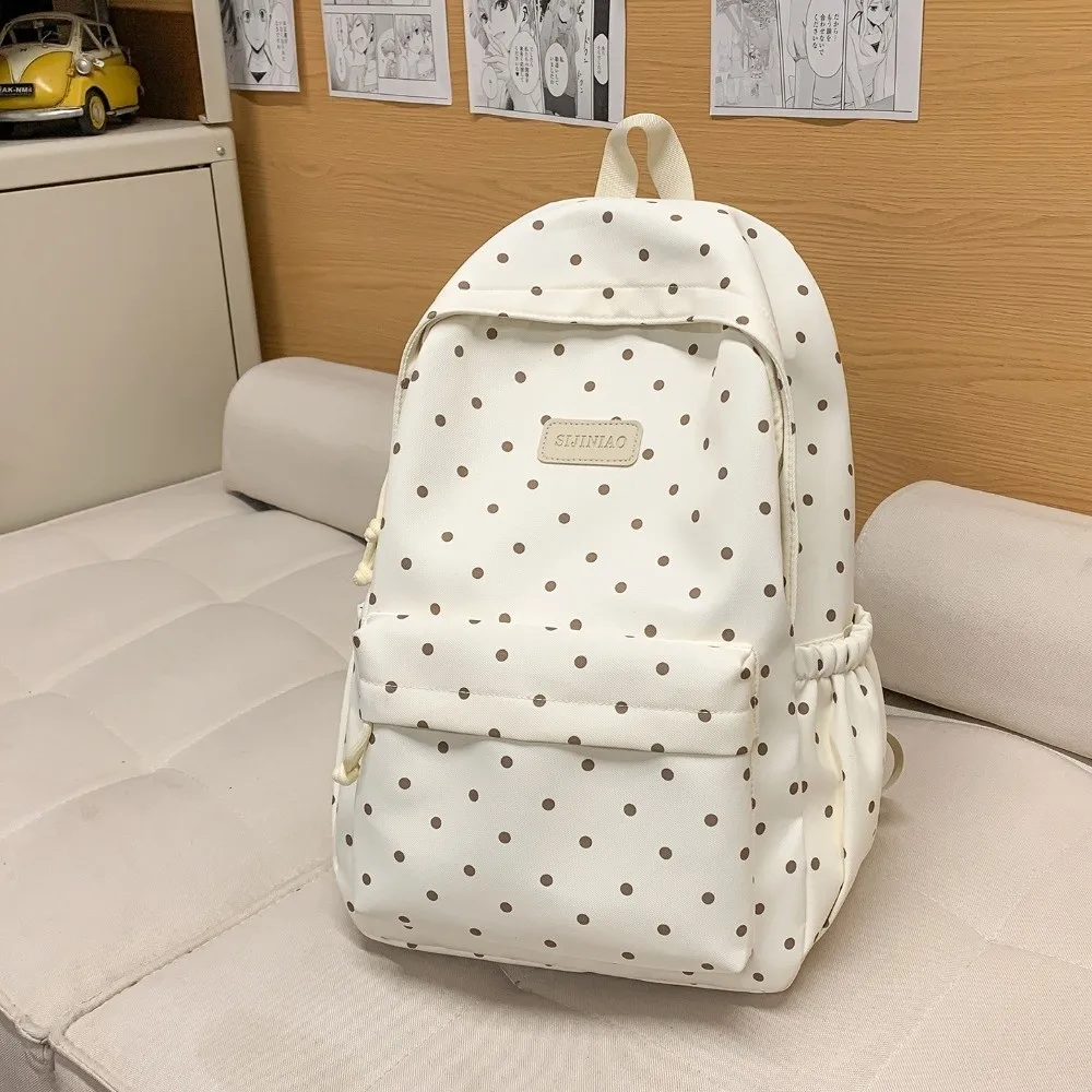 都会風のダブルショルダーポルカドットバックパック、軽量でかわいい旅行用バックパック、防水性と耐久性のあるスクールバッグ、ラップトップ用バッグ