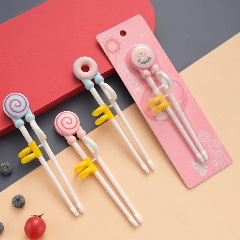 Children's Training Chopsticks Are Cute, Non Slip, Sunken Tips, and Adjustable Finger Holders Are Easy To Use. Dishwasher Safety