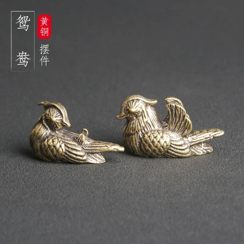 

Brass mandarin ducks, a pair of desktop ornaments, national tide, traditional cultural toys, tea pet ornaments, handicrafts old