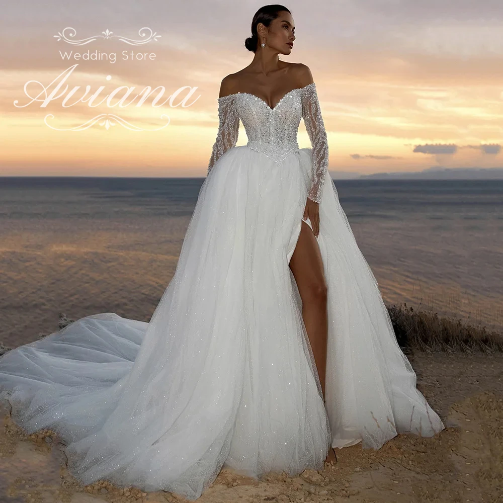 

Customized Aviana Off Shoulder Long Sleeves Glitter Embroidered Tulle Ball Gown Wedding Dress High Slit Long Train Bridal Gown