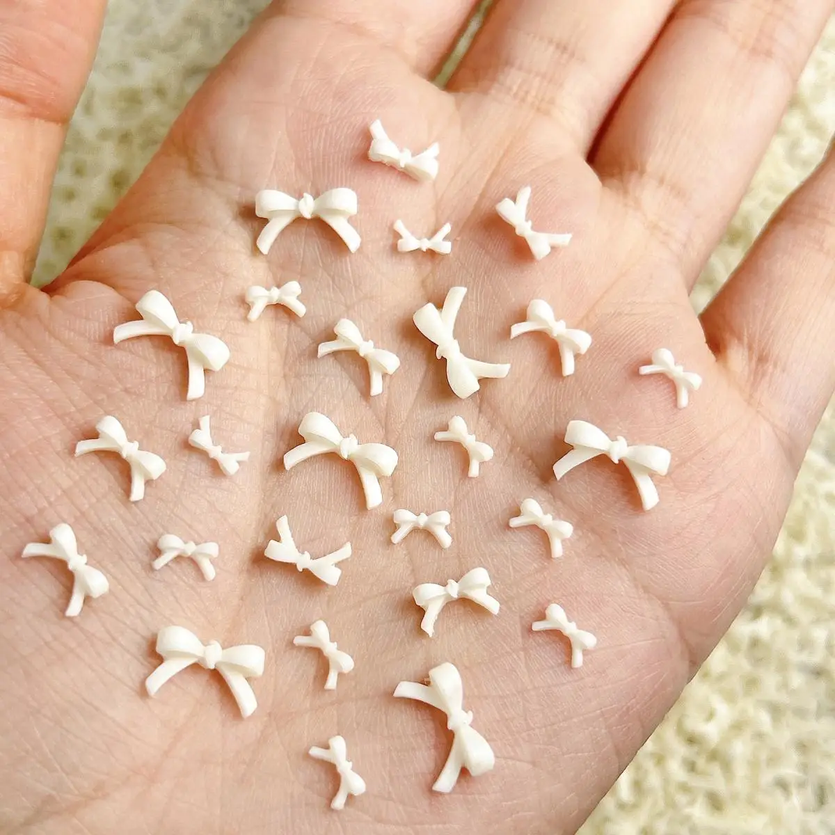 100PCS Fresh Light Yellow Mini Bow Nail Art Decoration Accessories 3D Resin 3-size Bow Nail Charms Supplies for Manicure DIY - Image 4