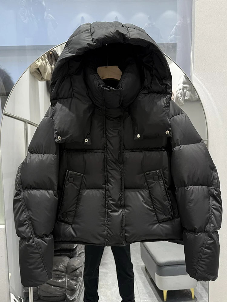 冬の新ダウンジャケット女性のショートフード付き厚いパフスプライシングレザー小さなホワイトダックダウン暖かいエレガントな気質コート