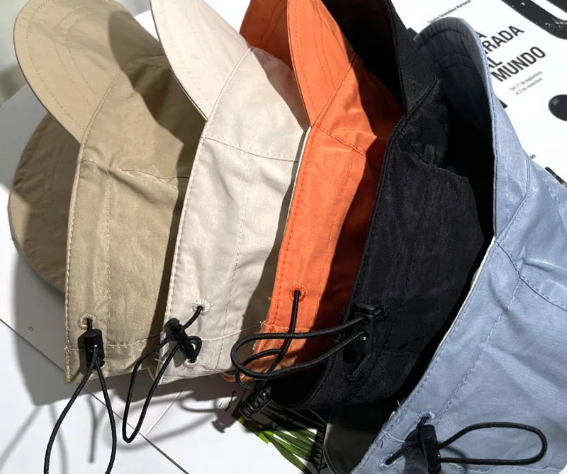 Cappello da sole pieghevole a tesa larga con coulisse berretti regolabili per uomo donna cappelli da spiaggia visiere estive ad asciugatura rapida berretto da pescatore