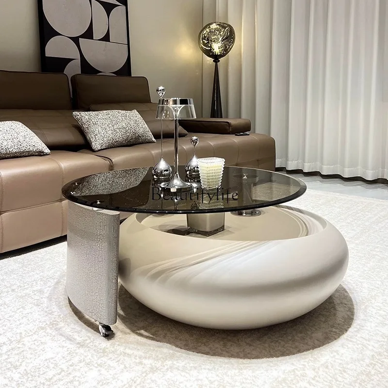 

Cream windshield rotating coffee table Italian minimalist small apartment small coffee table