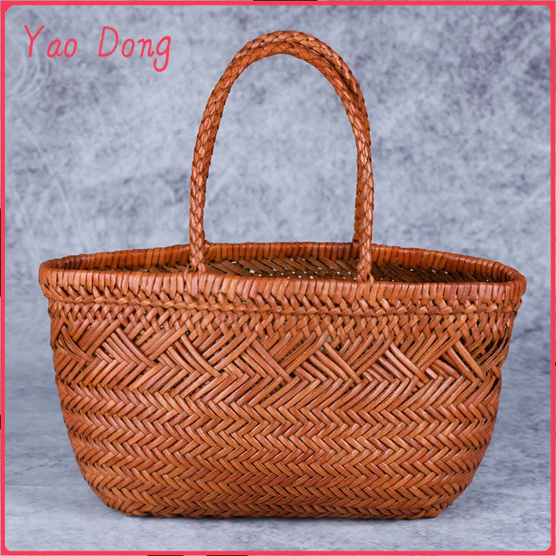 Yao Dong Designer woven totes bag women genuine leather cowskin knitting basket handbag female hollow out bucket bag 2022 summer