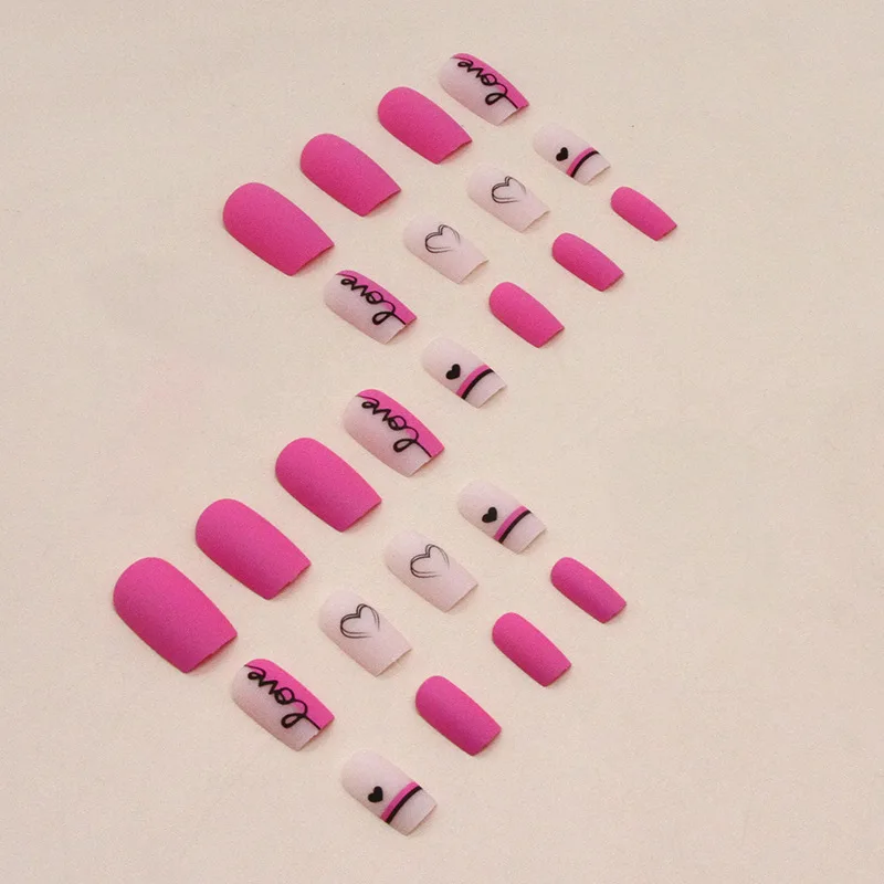 

24Pcs Medium Coffin Press-on Nails: Pink Matte with Black Hearts & 'LVOE' Doodle - Sweet Edgy Style