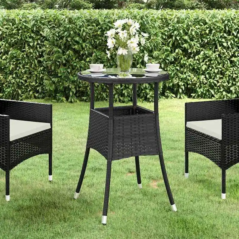 Table de jardin ronde noire Ø60×75 cm, structure en acier thermolaqué recouverte de résine tressée. Plateau en verre trempé 5 mm avec protection en caoutchouc, léger et facile à déplacer, adapté pour terrasse et jardin, assemblage à prévoir, housse recommandée pour prolonger la durée de vie.