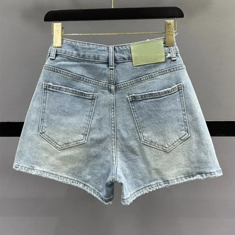 Short en jean brodé taille haute pour femme, pantalon amincissant rétro, pantalon tendance polyvalent, nouveau style, été 2024