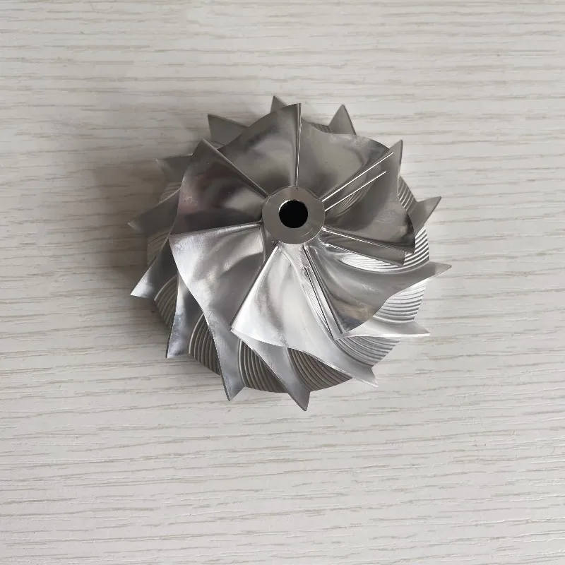 

TD05H вперед 57,69/78,00 мм 7 + 7 лезвий Высокопроизводительное фрезерование турбокомпрессора/алюминий 2618/колесо компрессора заготовки