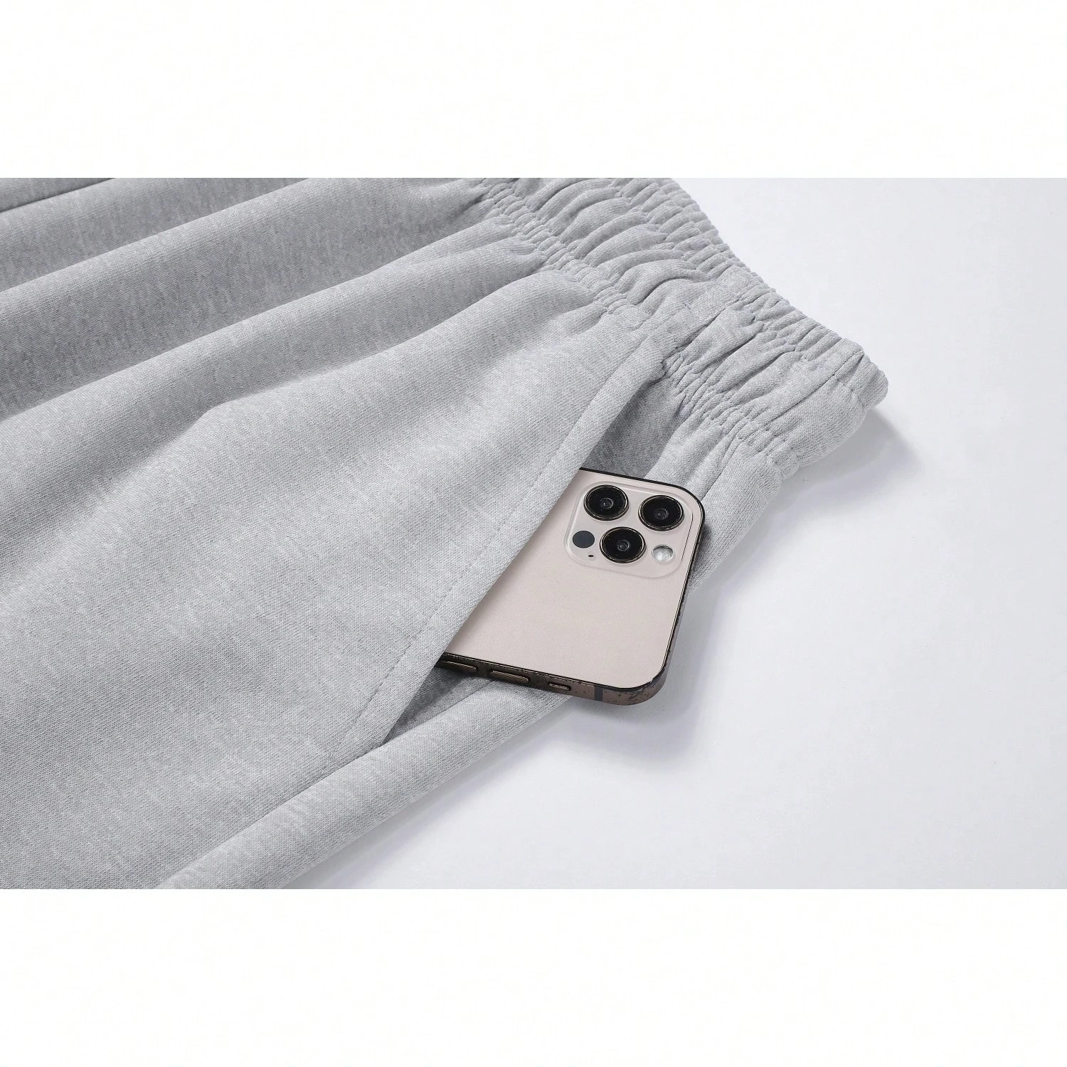 سراويل رياضية للرجال ذات مقاس عادي بلون سادة وخصر برباط للخريف والشتاء سراويل بتصميم جيب غير رسمية سراويل يومية للرجال