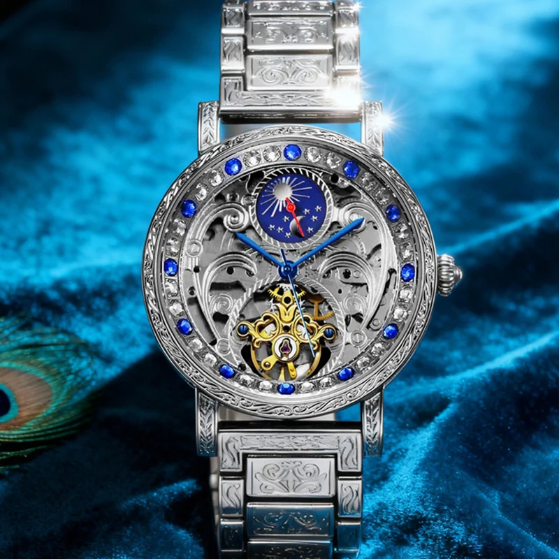 A men's silver vintage-style automatic tourbillon mechanical watch with delicate sun and moon engravings