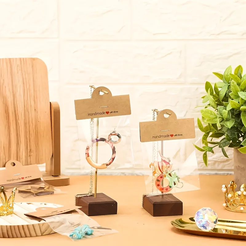 مجموعة عرض مجوهرات مصنوعة يدويًا مكونة من 100 قطعة - 50 حقيبة شفافة أنيقة و50 بطاقة مصنوعة يدويًا مع الحب، لعرض المجوهرات والأساور والأذن #3