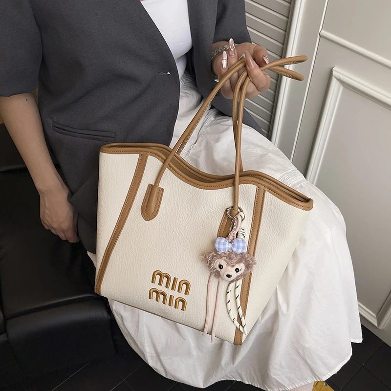 

Stylish Designer Paris Fashion Inspired Crossbody Handbag for Women with Minimalist Vintage Look and Logo