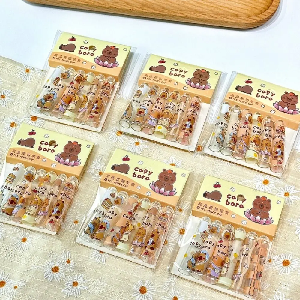 6PCS เครื่องเขียนน่ารัก Capybars ดินสอหมวกปลอดสารพิษ Kawaii ดินสอ Topper ครอบคลุมโปร่งใสการ์ตูนดินสอ Extender เด็ก