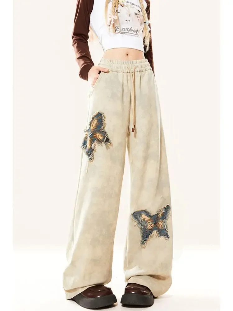 

Butterfly pattern raw edge panty women's autumn 2024 new design sense patch high waist casual straight wide-leg pants.