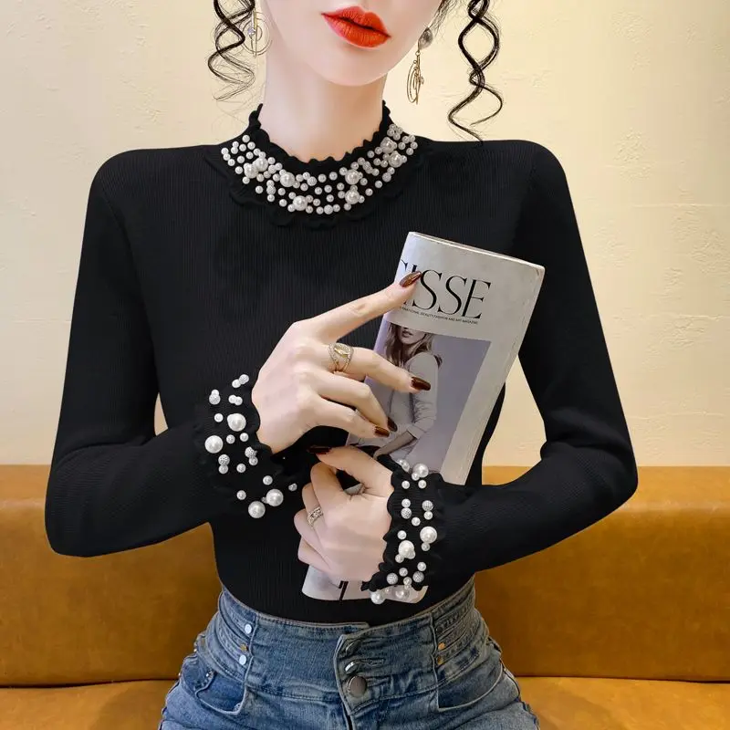 الكورية نمط شتاء جديد شبه عالية الياقة الدانتيل الصناعة الثقيلة مسمار حبة سميكة محبوك سترة المرأة أنيقة التخسيس