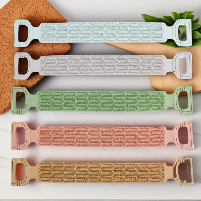 

Новая силиконовая мочалка-полотенце для спины с ручками-веревками, отшелушивающий банный инструмент для глубокой очистки, с текстурированной поверхностью для легкого доступа.