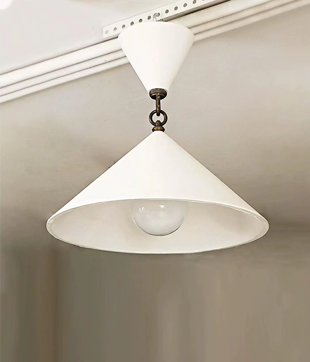 

Mid-century conical gypsum ceiling lights for bedrooms: sleek, soft-glowing, pairing with walnut furniture.