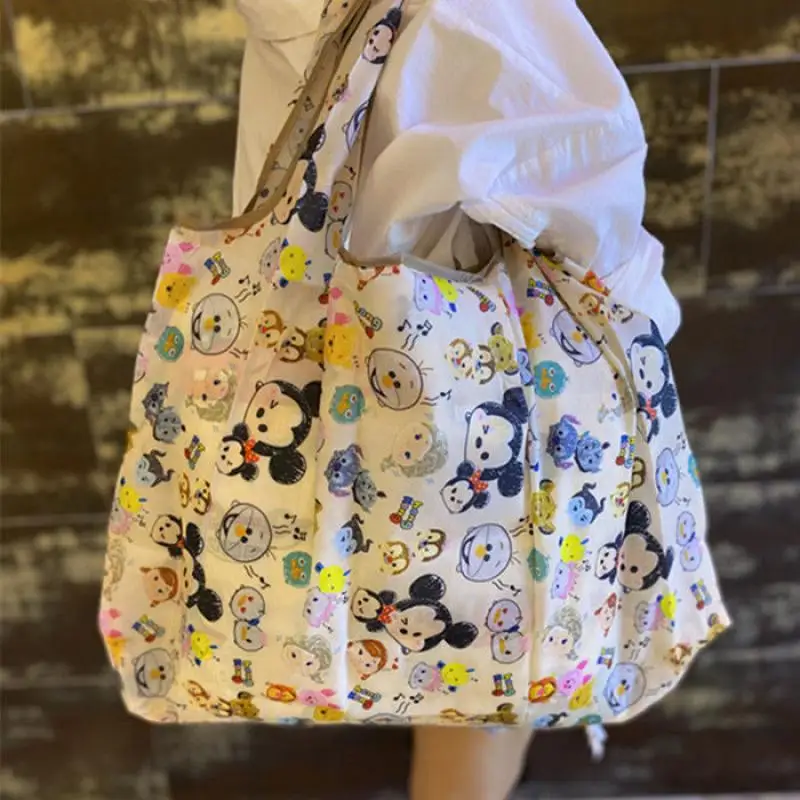 Nuovo Kawaii Miniso Cartoon Snoopy Mickey Cinnamoroll Kuromi Pompompurin Shopping Bag borsa da viaggio portatile pieghevole di grande capacità