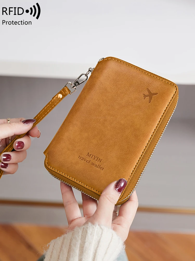 Minimalist and fashionable RFID passport holder multifunctional PU leather travel accessory passport holder wallet holder unisex