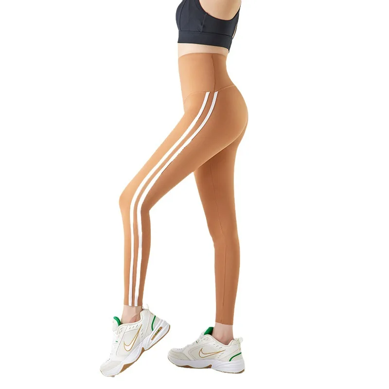 2025 Nuovi pantaloni da yoga slim fit elastici in pelle arca Abbigliamento da esterno da donna Pantaloni da yoga sportivi in nylon a vita alta a nove punti