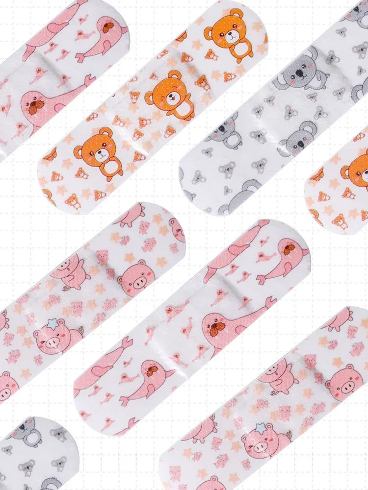 Impermeável Cute Cartoon Band Aid, ferida adesivo gesso bandagens, kit de emergência de primeiros socorros para crianças, crianças, bebê, 100pcs