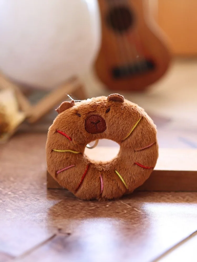 1 ชิ้น Creative Donut ตกแต่งอาหารตุ๊กตาพวงกุญแจการ์ตูน Capybara จี้ Soft Plush ตุ๊กตากระเป๋าอุปกรณ์เสริม
