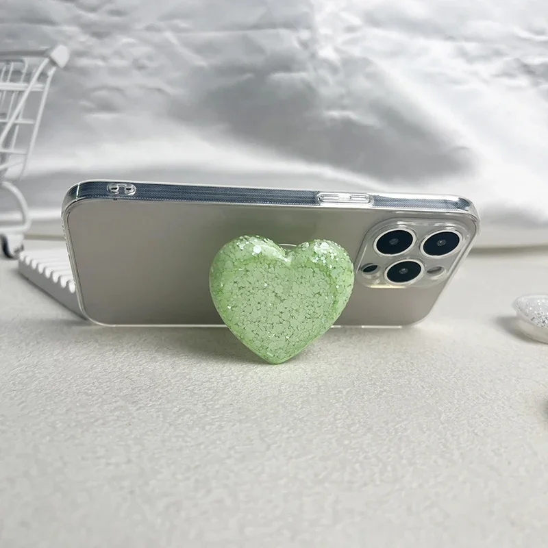 حامل هاتف على شكل قلب لامع جديد، حامل قابل للطي لسطح المكتب كسول، قبضة هاتف على شكل قلب لامع من ماكرون