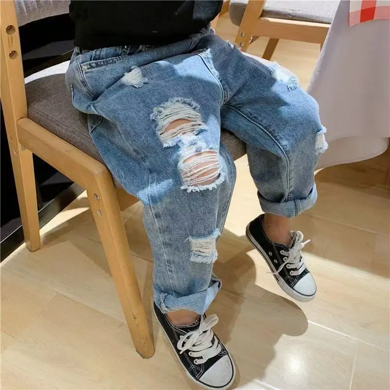 

2025 Children's Spring and Autumn New Jeans for Boys and Girls with Ripped Holes Soft and Comfortable Pants for Children Trendy