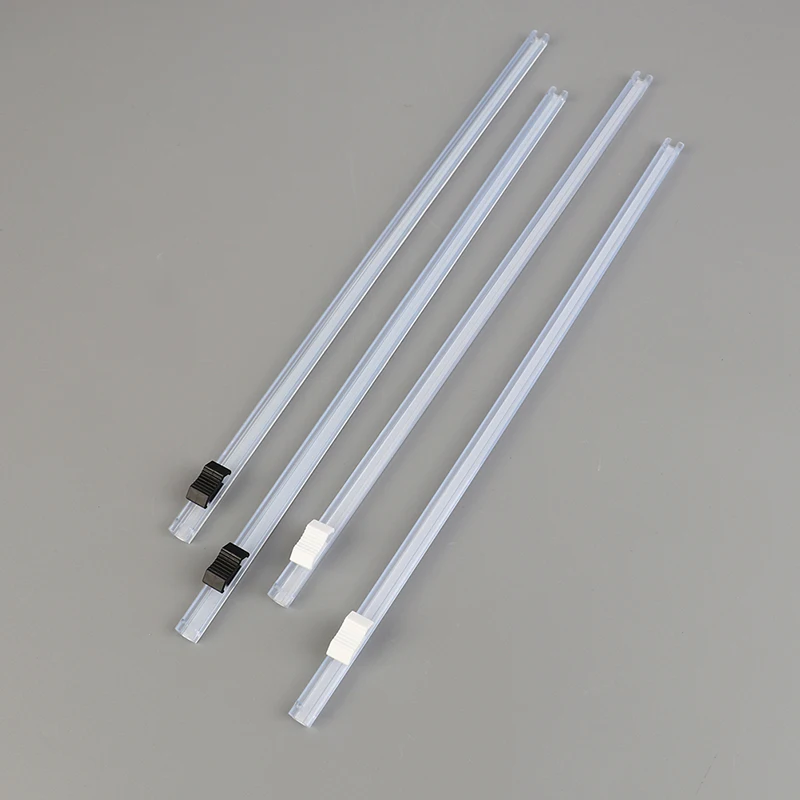 Dispenser per involucro di plastica e taglierina per pellicola per alimenti parte per taglierina per pellicola trasparente