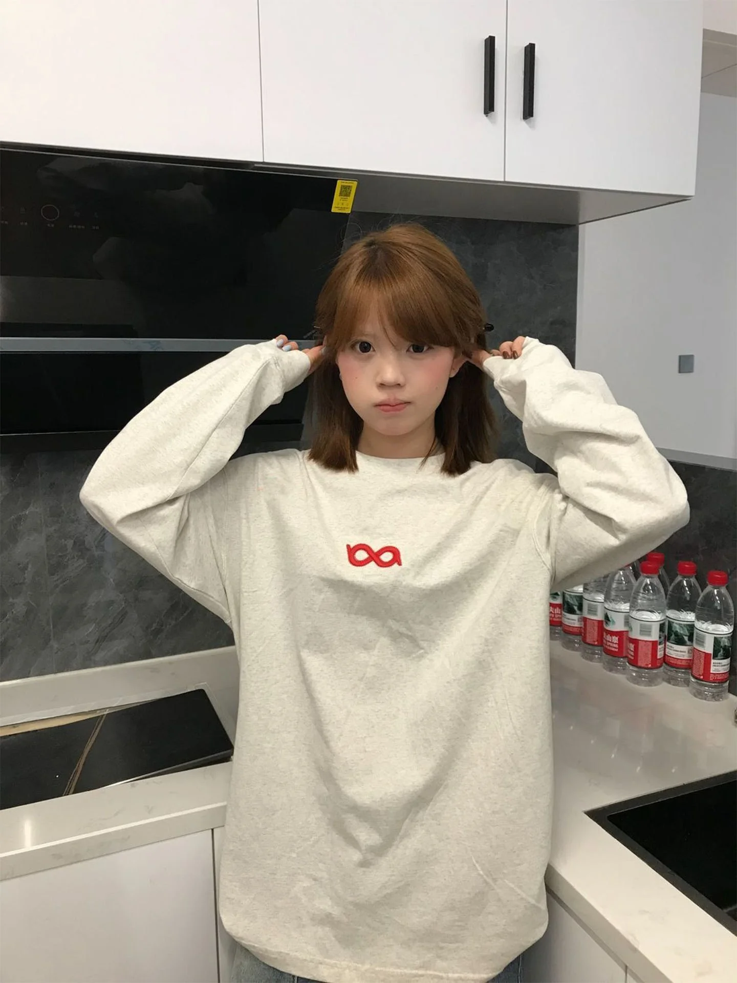 T-shirt lunga ampia in cotone Sve Coreano Sle Campus Stampa Top casual per donna Stagione autunnale Faionable e confortevole