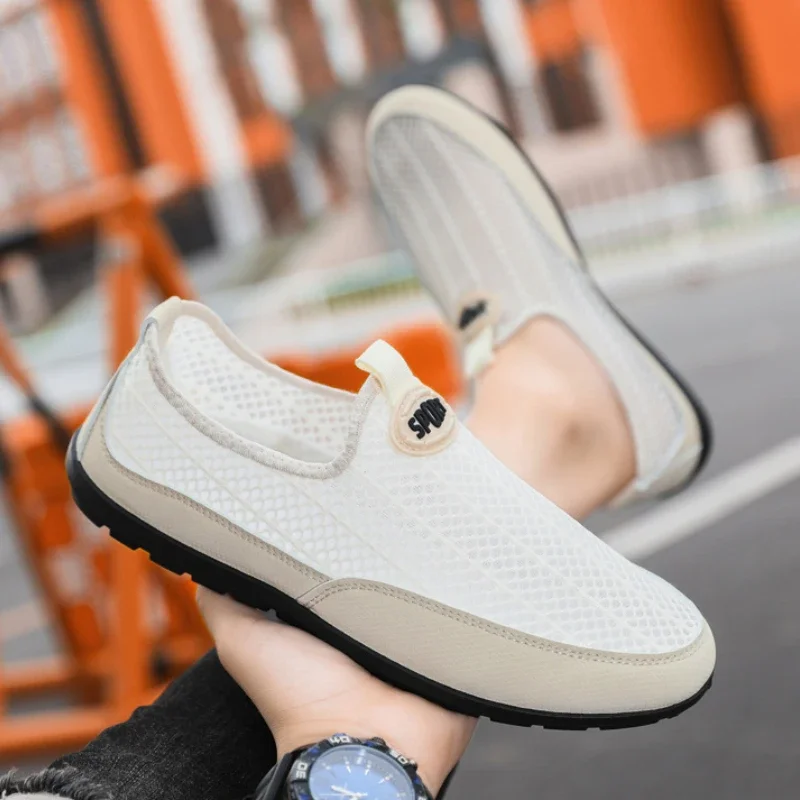 Sepatu kasual jala untuk pria Fashion nyaman pria Sneakers ringan sol lembut sepatu jalan desainer antiselip sepatu pria