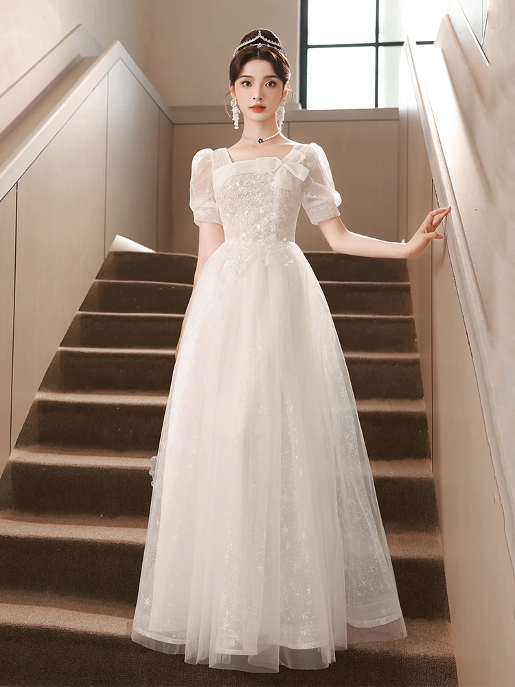 

Элегантное белое вечернее платье: сказочная атмосфера, роскошь высшего класса, для торжественных мероприятий, балов и церемоний, для ведущих, с изысканным стилем