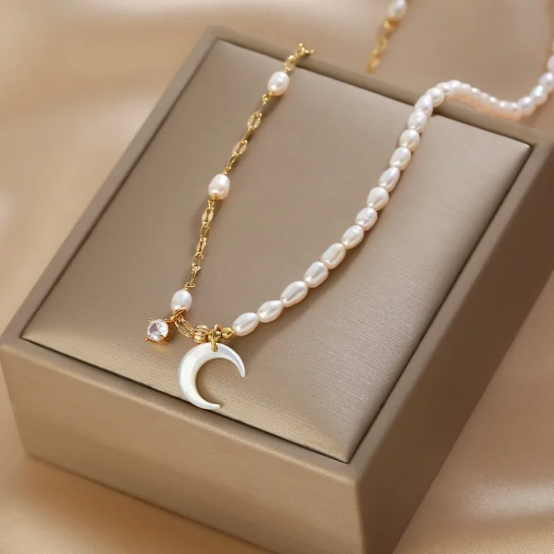 ALLNEWME Dainty Rice Freshwater Pearl Beaded Necklaces for Women  Gold Plated Brass White Shell Moon Asymmetry Chain Choker