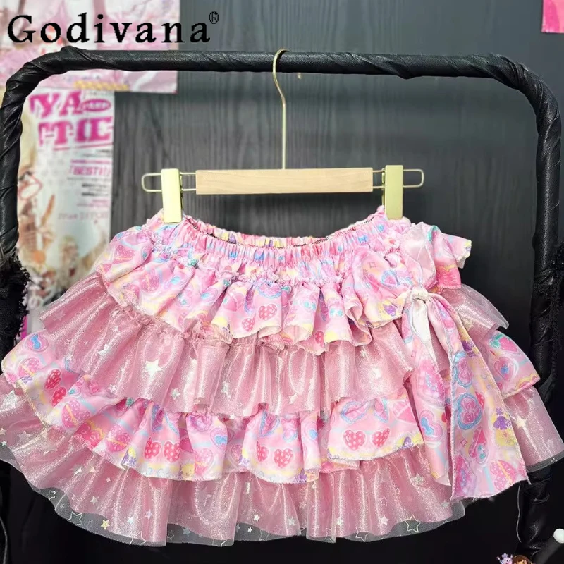 الحلو الأصلي لطيف الوردي تنورة المرأة المطبوعة Y2K القوس تصميم رقيق كعكة اللباس الإناث الصيف الشارع ارتداء الأميرة تنورة صغيرة