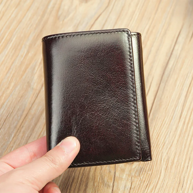 Cross-border best-selling 30% off short style wallet made of genuine leather men's large capacity card bag, money clip wallet.