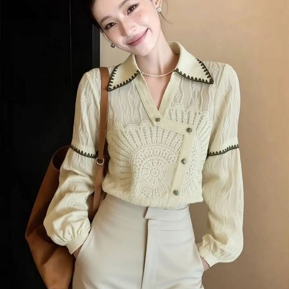 

2026 spring high-end super good-looking, unique and beautiful design sense, niche does not collide with apricot shirt women