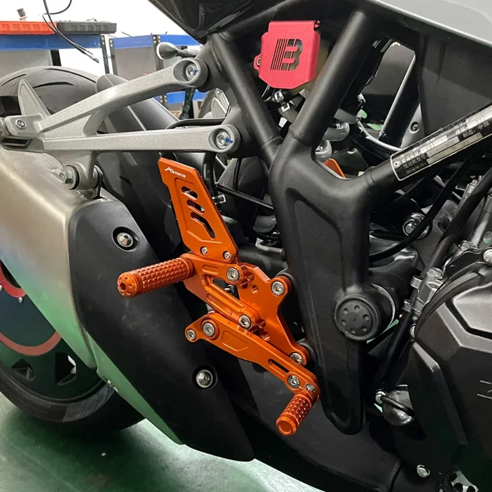Non-destructive installation racing footpegs for KOVE 321RR; adjustable-height rear-set assembly; high-quality aftermarket parts