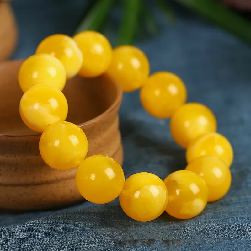 First-generation raw bracelet with 108 beads  old amber in chicken fat yellow color