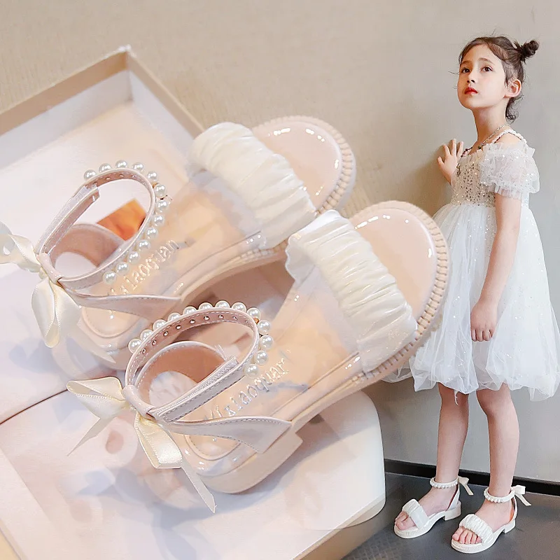 

Детские летние элегантные сандалии для девочек, с бантом, модные, с бисером, на ремешке на щиколотке, повседневные, милые, в римском стиле